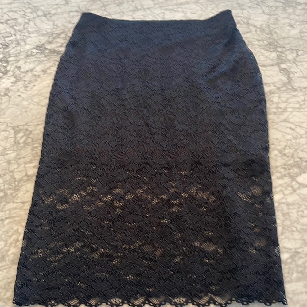 Zara Black Skirt. Never worn!! Lace knee length, skirt mini